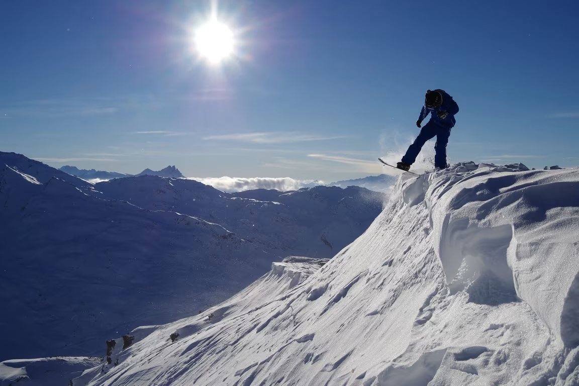 A Snowtailors instructor with a four-year-old on the Pralong magic carpet, Courchevel